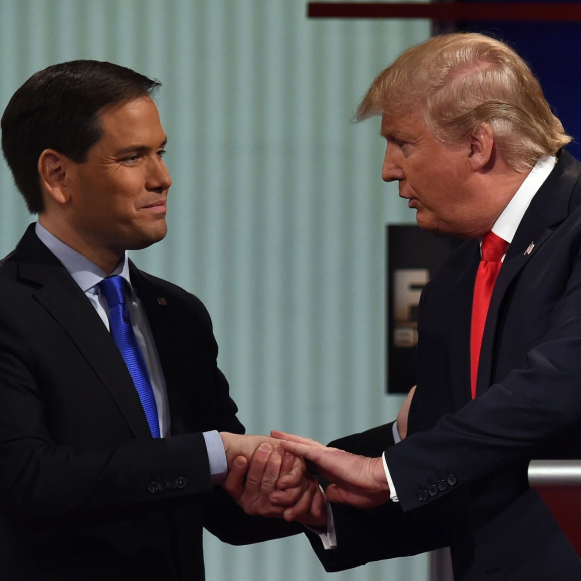 trump and rubio shaking hands