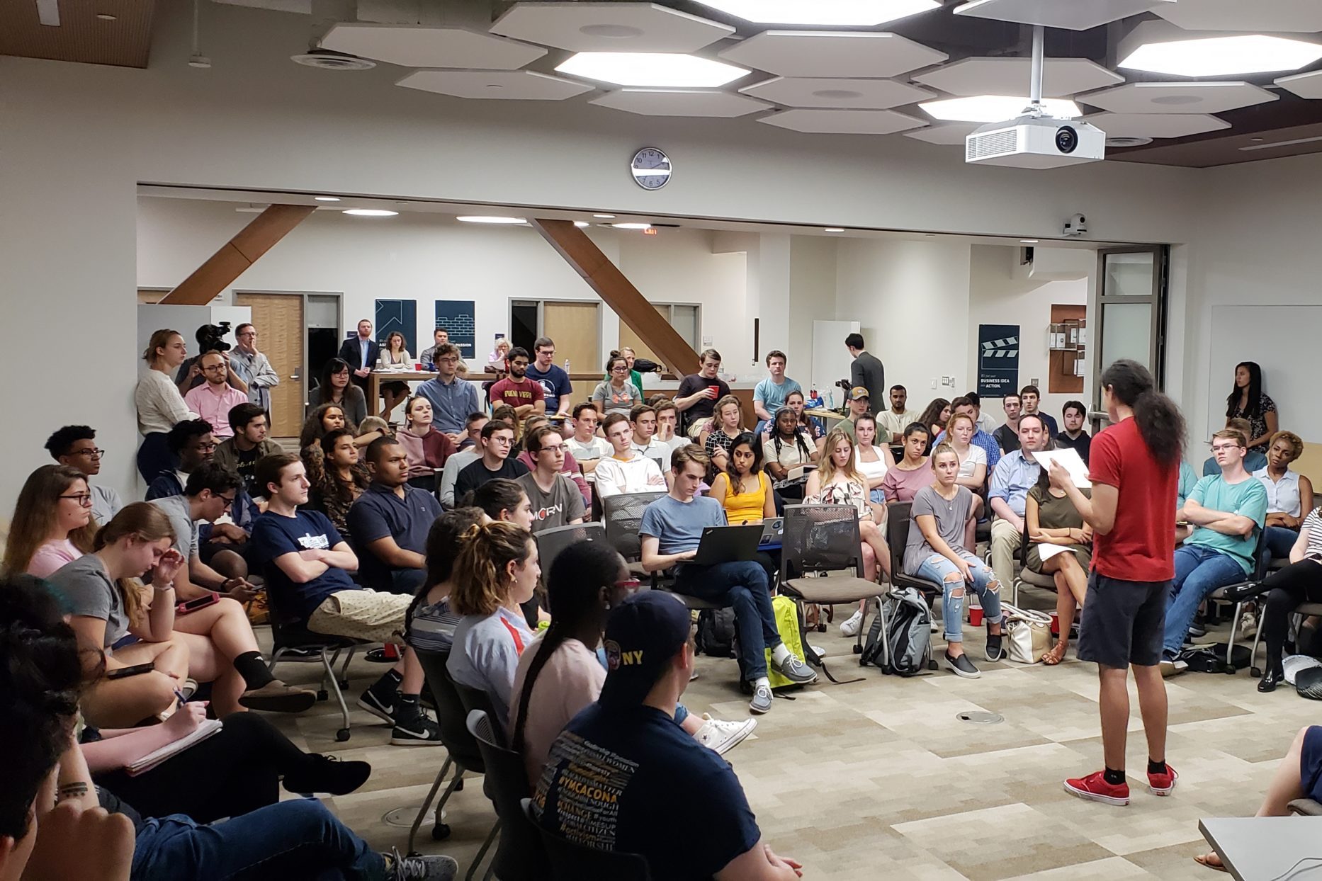 students debating at college campus