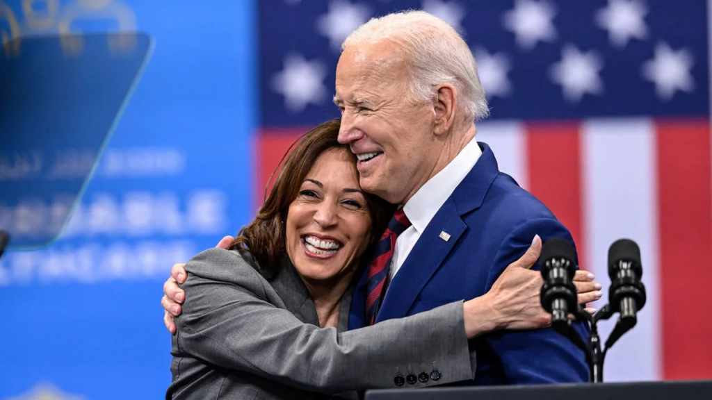 kamala harris hugging joe biden on stage