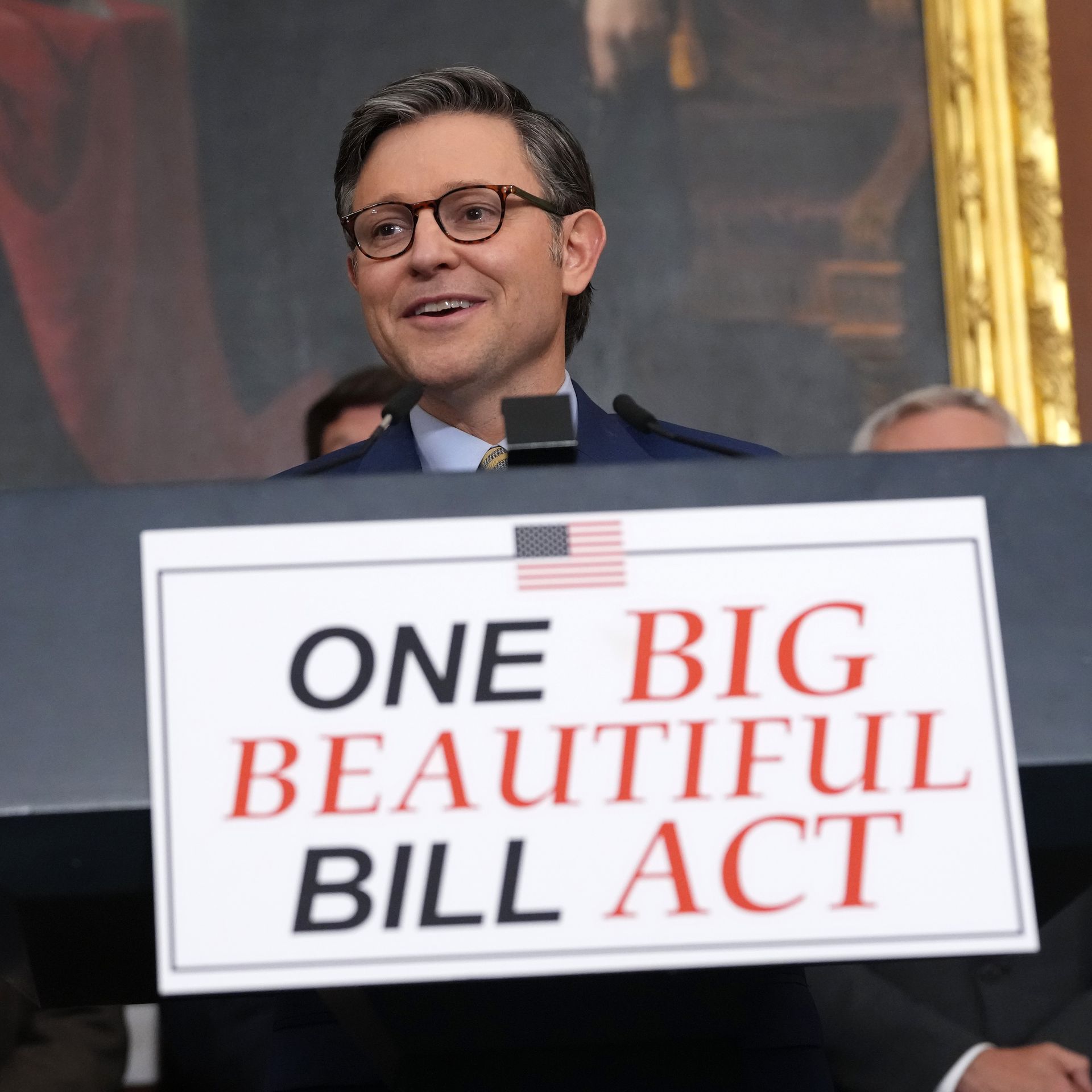 mike johnson talking with big beautiful bill sign