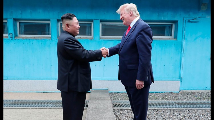 President Donald Trump and North Korean leader Kim Jong Un shaking hands at DMZ
