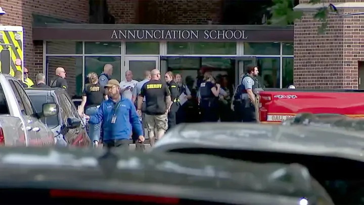 Responders gather outside of Annunciation Catholic School in Minneapolis after a reported mass shooting there on August 27, 2025. (Credit: KMSP)