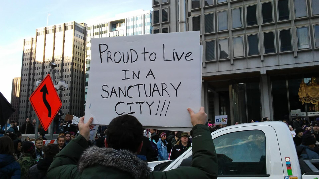 A "Sanctuary City" protest sign