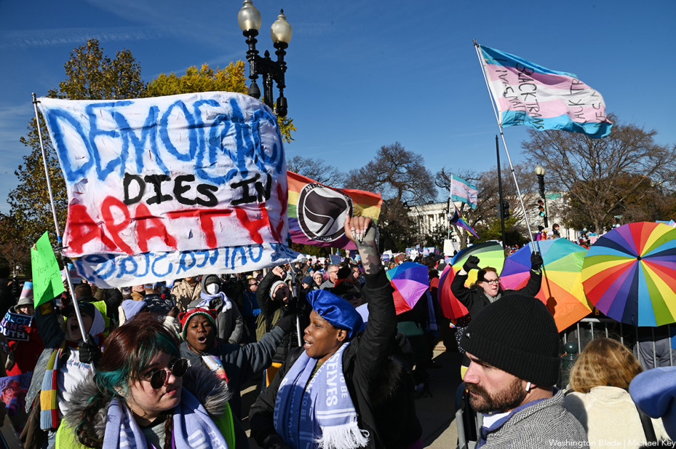 a transgender rights supporter at a rally outside the Supreme Court