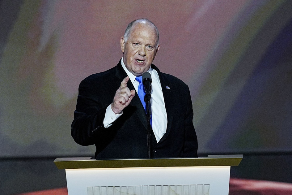 Tom Homan speaking at a podium