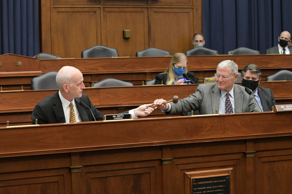a chairman's gavel on a desk in a legislative chamber