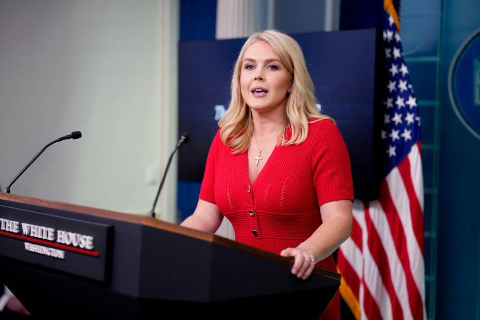 White House press secretary Karoline Leavitt at podium, speaking aggressively