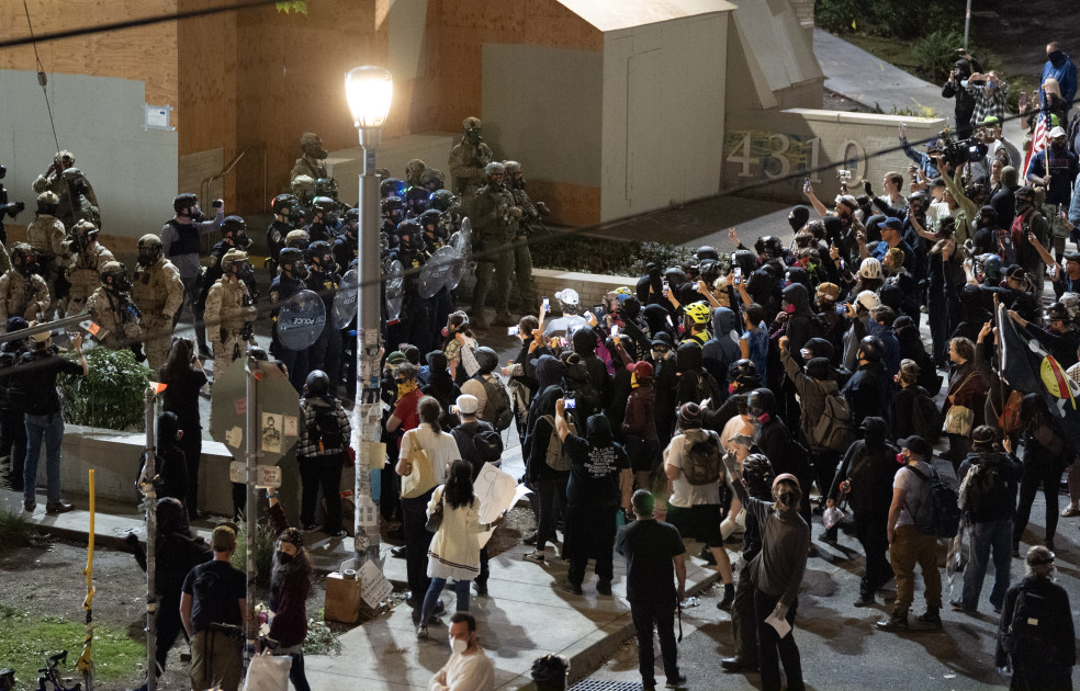 protesters confronting law enforcement Portland ICE facility