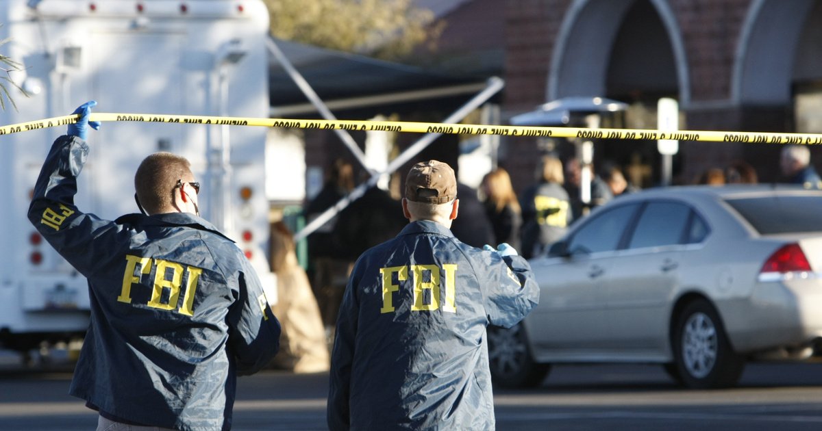 FBI agents conducting investigation scene