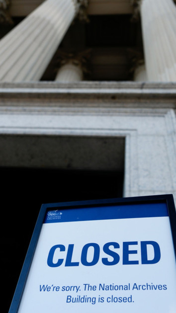 a closed sign on a federal building like the National Archives