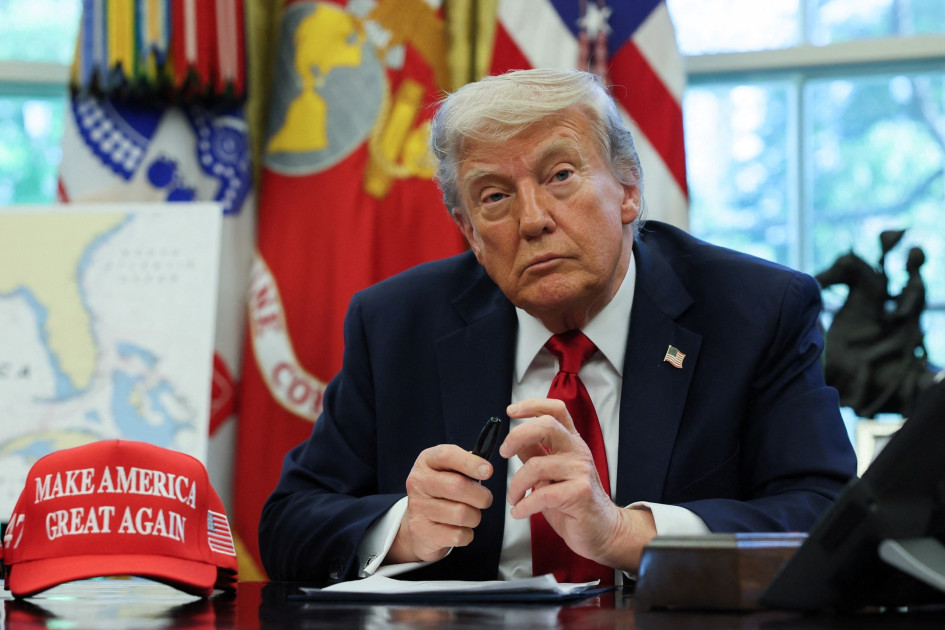Trump 2028 red hat on Oval Office desk