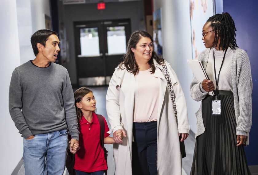 immigrant family meeting with social services enrollment counselor