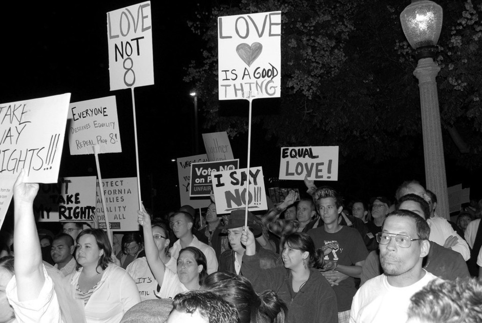protesters with marriage equality signs