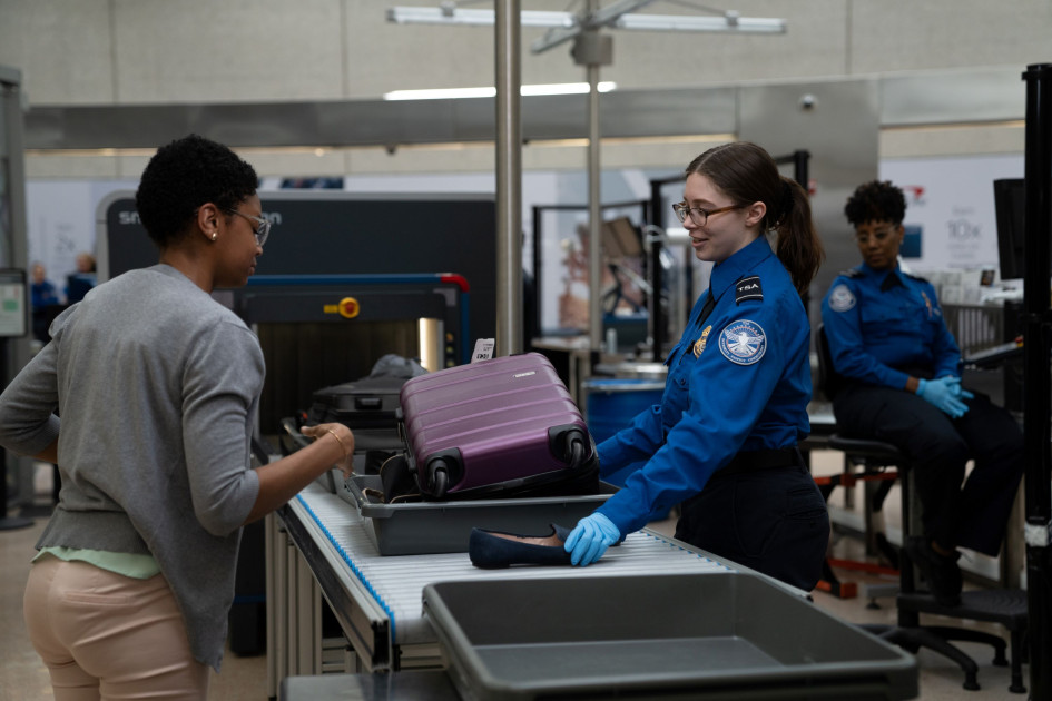 tsa agents conducting security screenings
