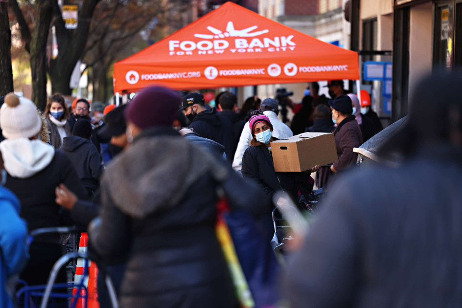 long line outside a food bank in a US city