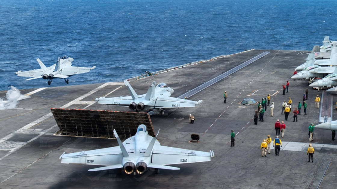 F-18 fighter jet taking off from an aircraft carrier