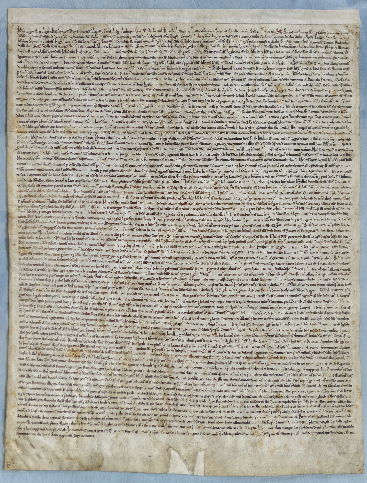 An aged parchment copy of the Magna Carta, showing Clause 39